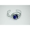 Bracelet "oeil" avec cabochon bleu foncé translucide