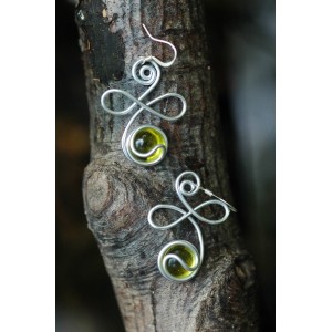 Boucles d'oreilles "Volute" : longues ou courtes?