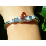 Thin hand-made bracelet with small natural stone